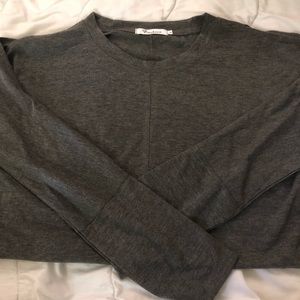 Cold shoulder dark grey top.  Never worn.